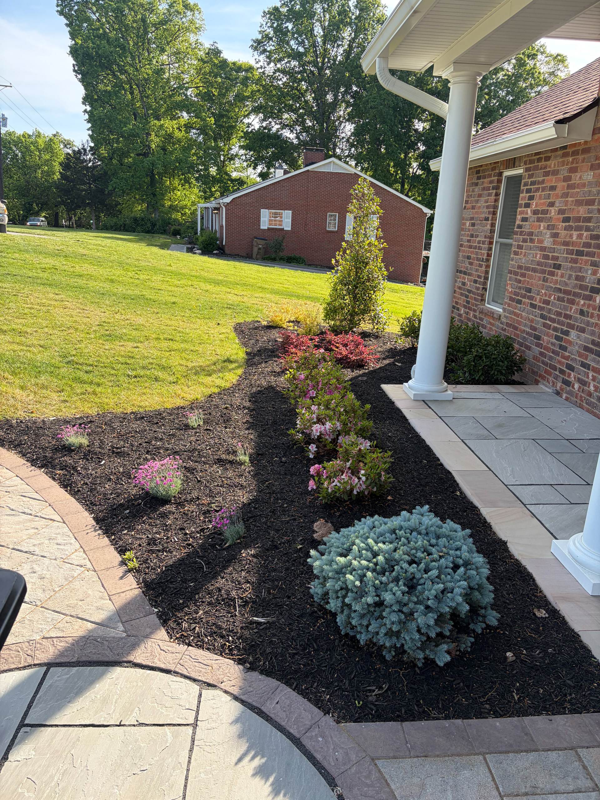 Flagstone walkway and landscaped garden bed at a Knoxville-area home